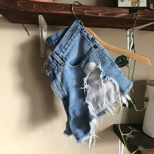 Levi highly distressed high waist shorts
